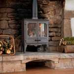 Poêle à bois dans la salle du Village du Val Richard