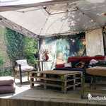 Tonnelle avec salon dans le jardin - Au Café Vagabond